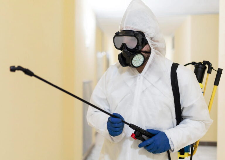 Enviro Guard pest control technician providing residential pest control service at Las Vegas home